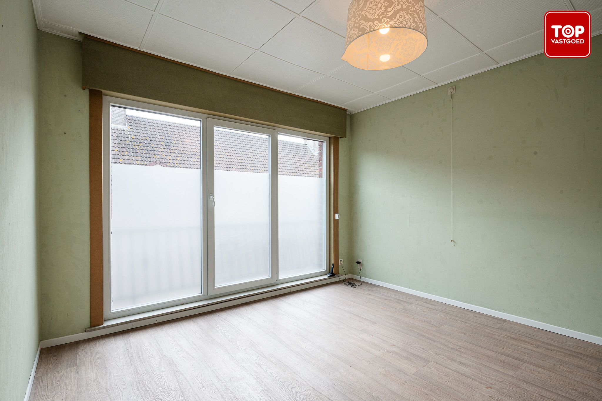 Halfopen woning met leuke tuin in centrum eeklo foto 12