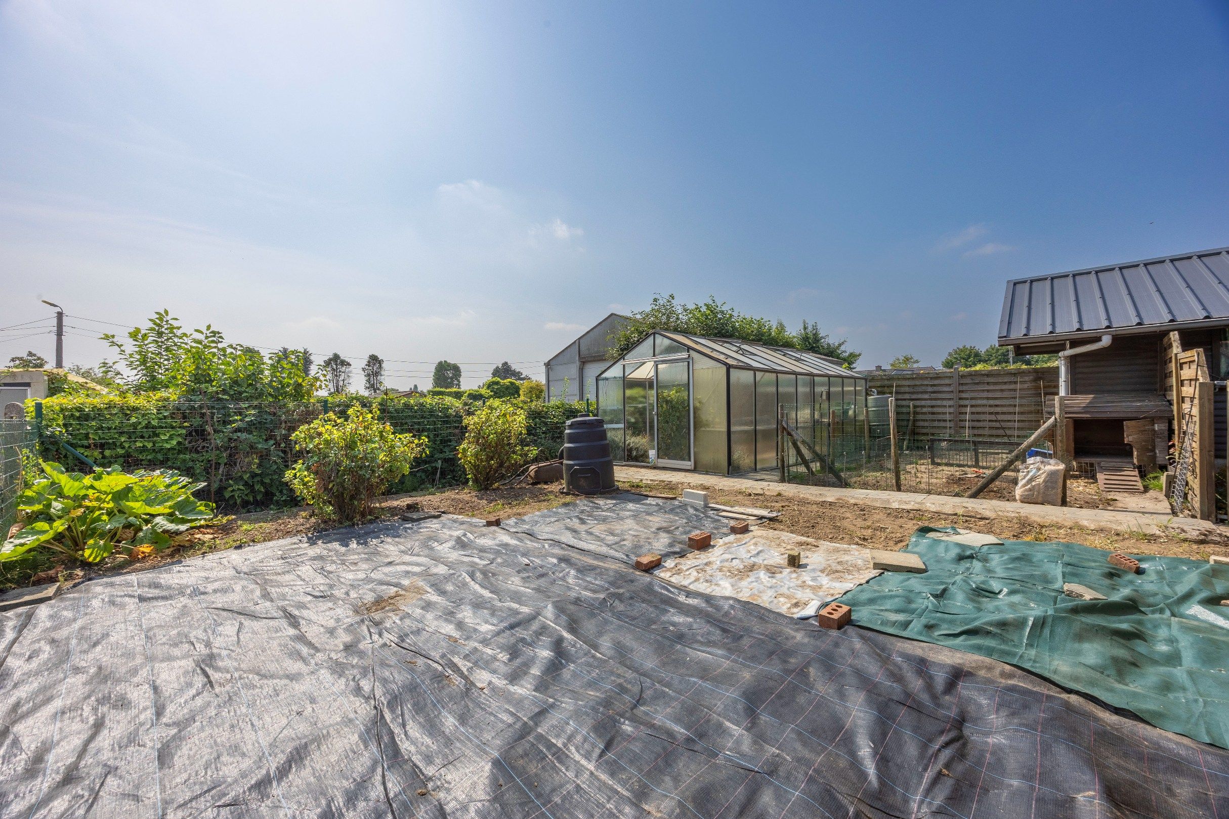 HALFOPEN WONING MET TUIN EN GARAGE foto 14