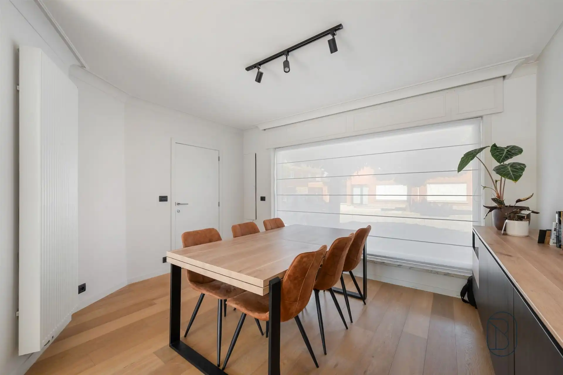 Instapklare woning met zonnige tuin, garage & tweede uitweg foto 4