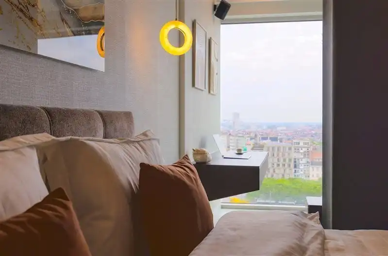 High-end gemeubeld 1-slaapkamerappartement in de iconische Antwerp Tower foto 17