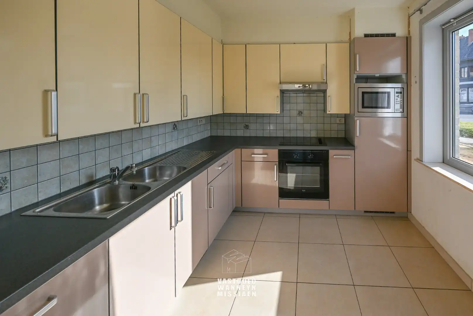 Ruim gelijkvloers appartement met 2 slpk en zonnige tuin/terras foto 8