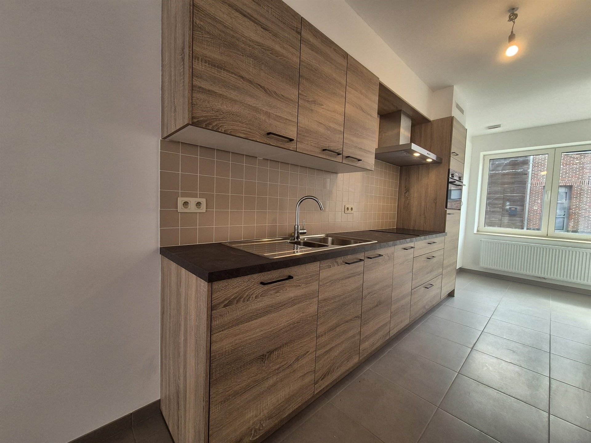 Zeer energiezuinige woning met 2 slaapkamers en tuin. foto 5