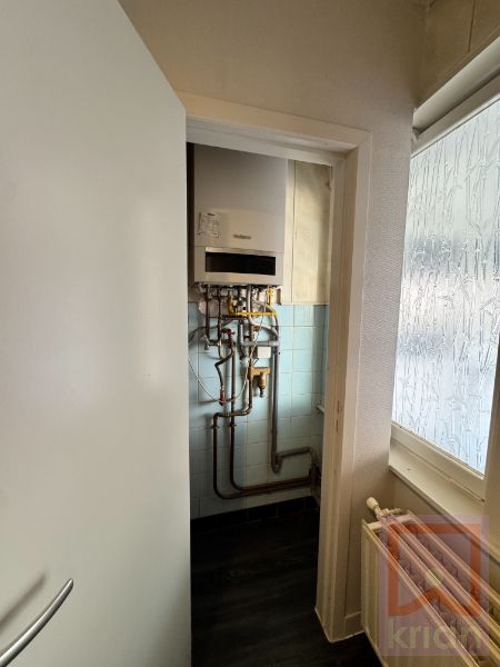 Ruime energiezuinige woning met 3 slpks, zolder, veranda, kelder en magazijn foto 10