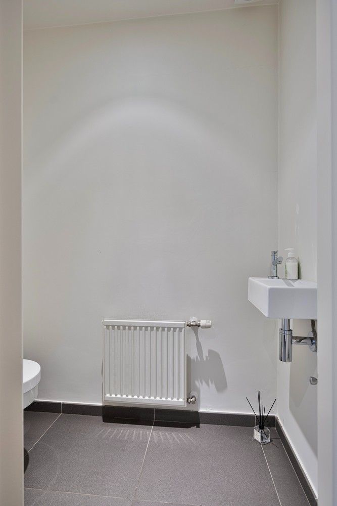 Stijlvol wonen in As: ruime, instapklare woning met tuin en garage foto 17