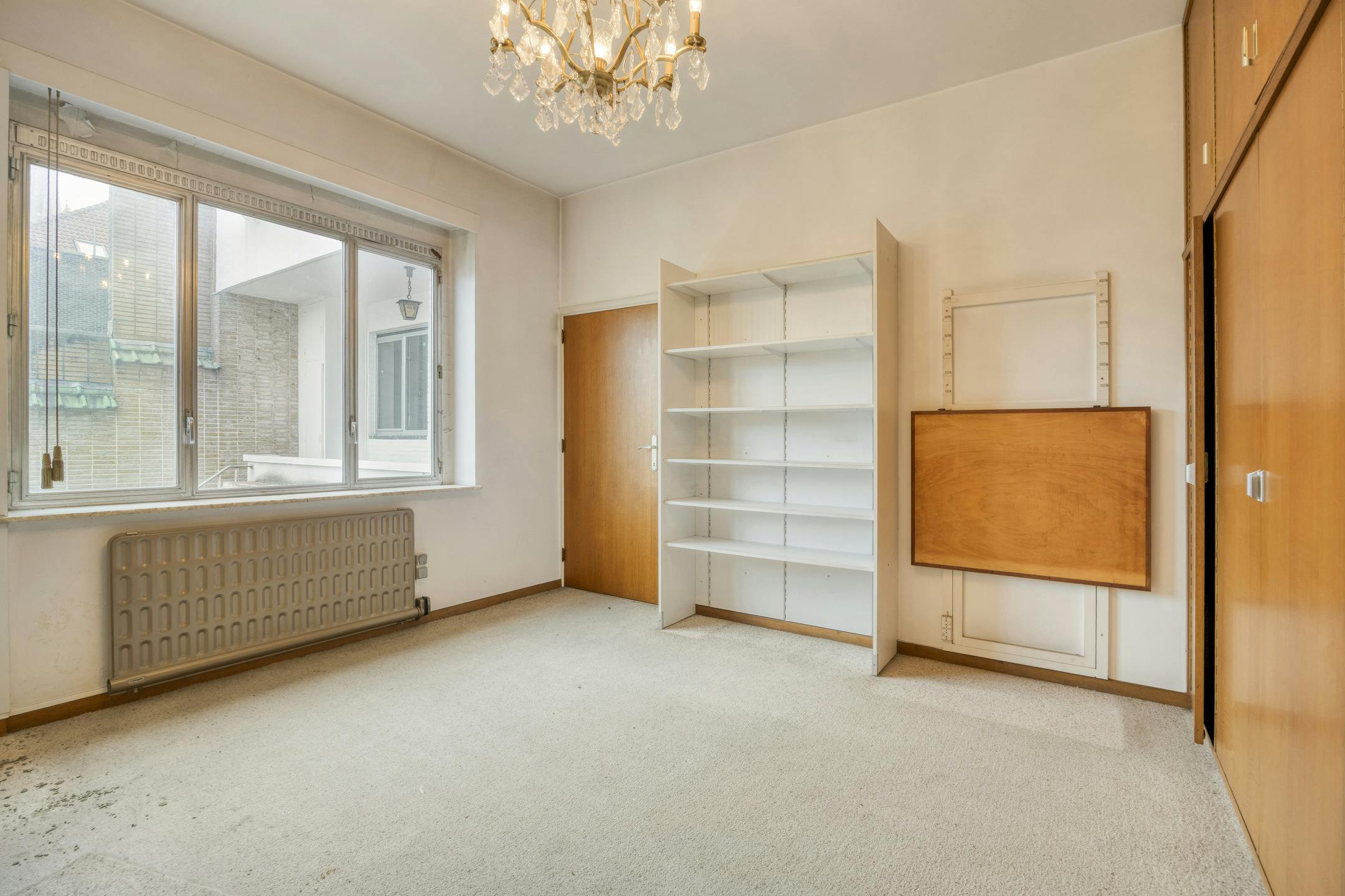 Te renoveren opbrengsteigendom met 3 appartementen en handelspand in Antwerpen foto 7