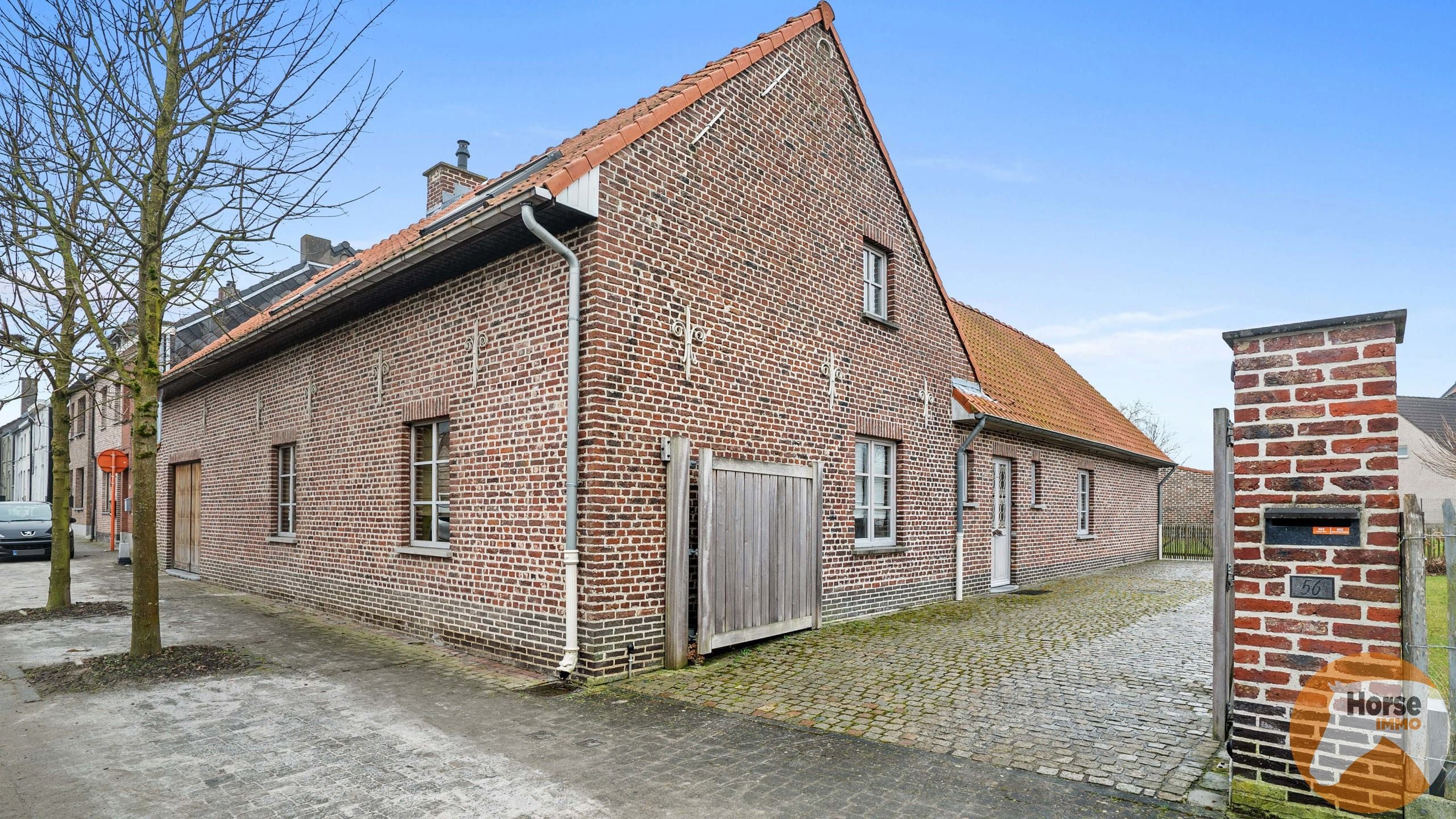 Hoofdfoto van de publicatie: NIEUWERKERKEN - Instapklare woning met 2 stallen + bouwgrond