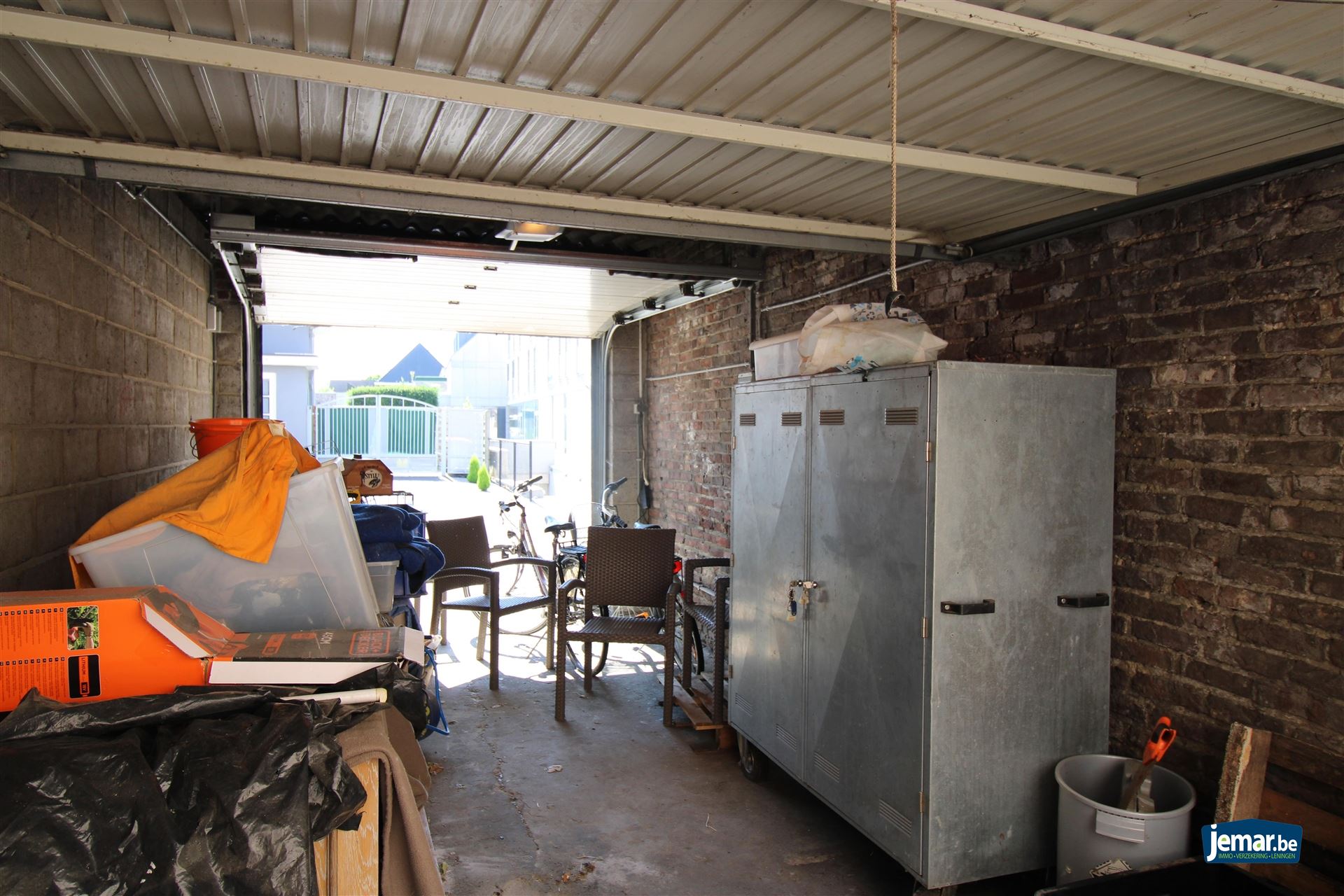 Karaktervol handelspand met woonst op toplocatie – ideaal om wonen en werken te combineren in het hart van Maasmechelen! foto 17