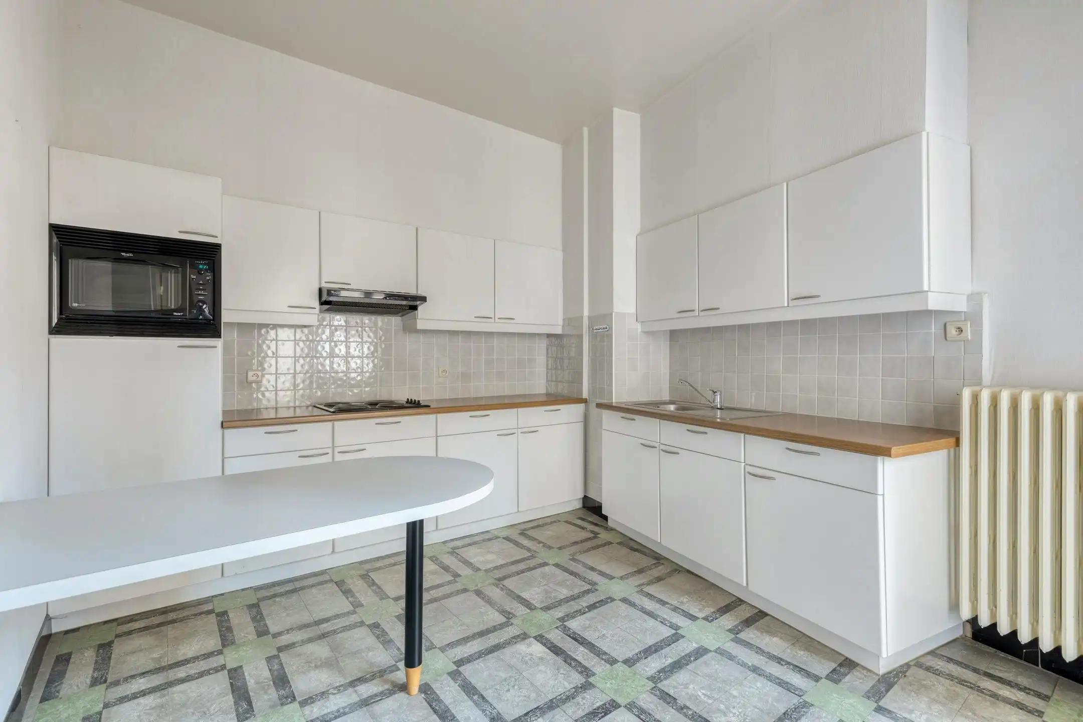 Appartement met 3 kamers en garagebox te koop in centrum Kortrijk foto 6