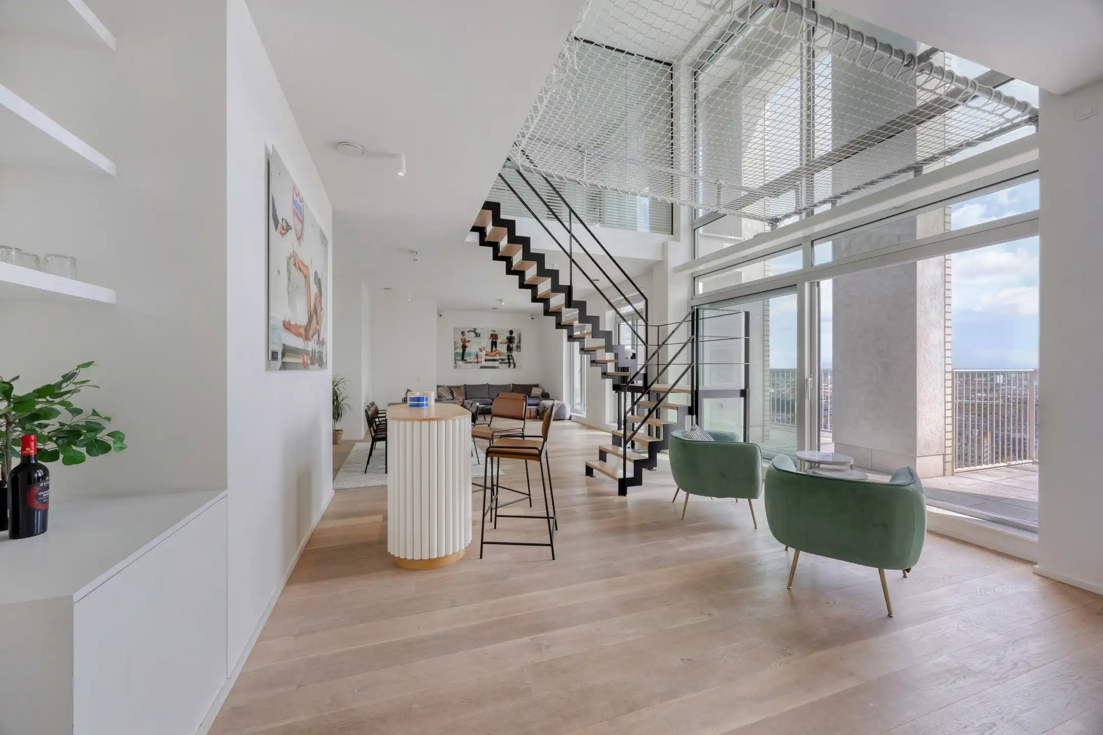 Exclusieve penthouse met panoramisch zicht over Antwerpen foto {{pictureIndex}}