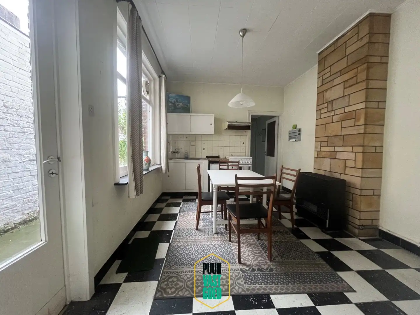 Op te knappen belle-époque woning met 'ziel' en een heel toffe tuin foto 8