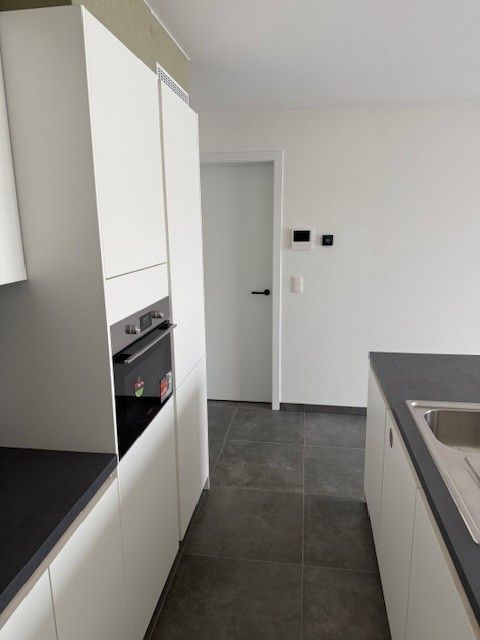 Nieuwbouw energiezuinig appartement met 2 slaapkamers, terras en parking in centrum Houthalen foto 7