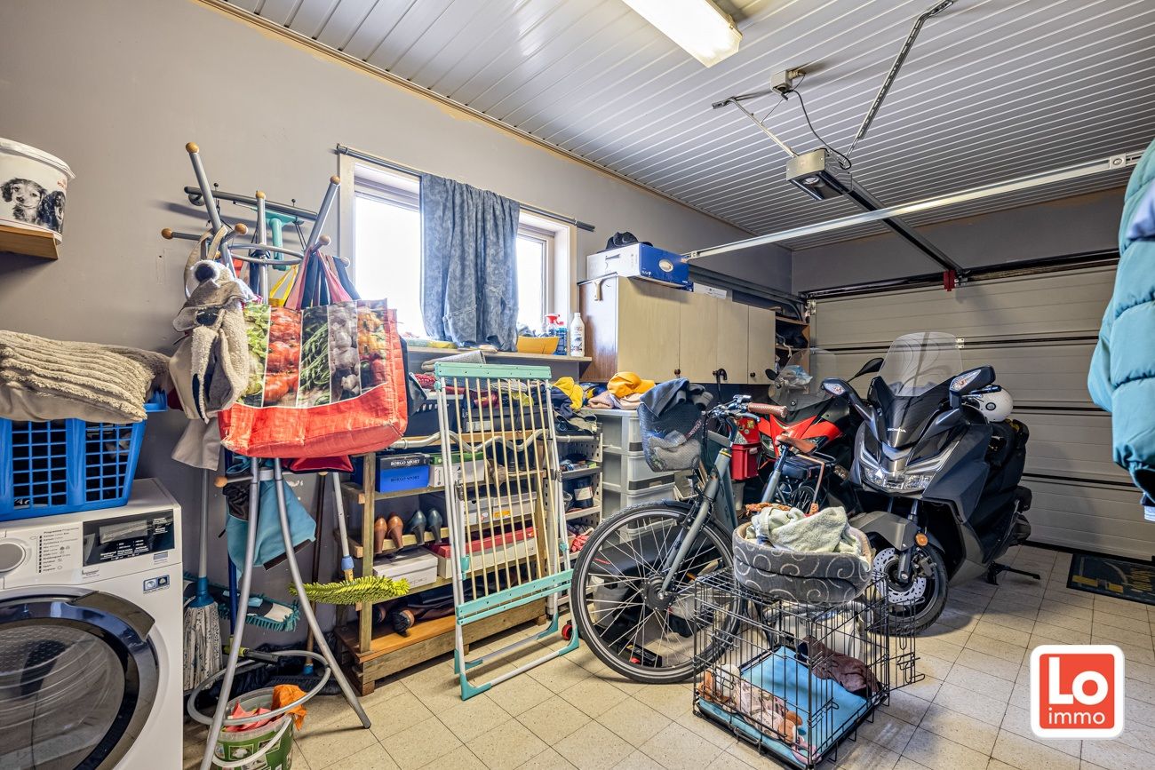 VERKOCHT! Degelijke open gelijkvloerse woning met inpandige garage en dubbele carport op een heel rustige locatie in het hartje van Lochristi! foto 15