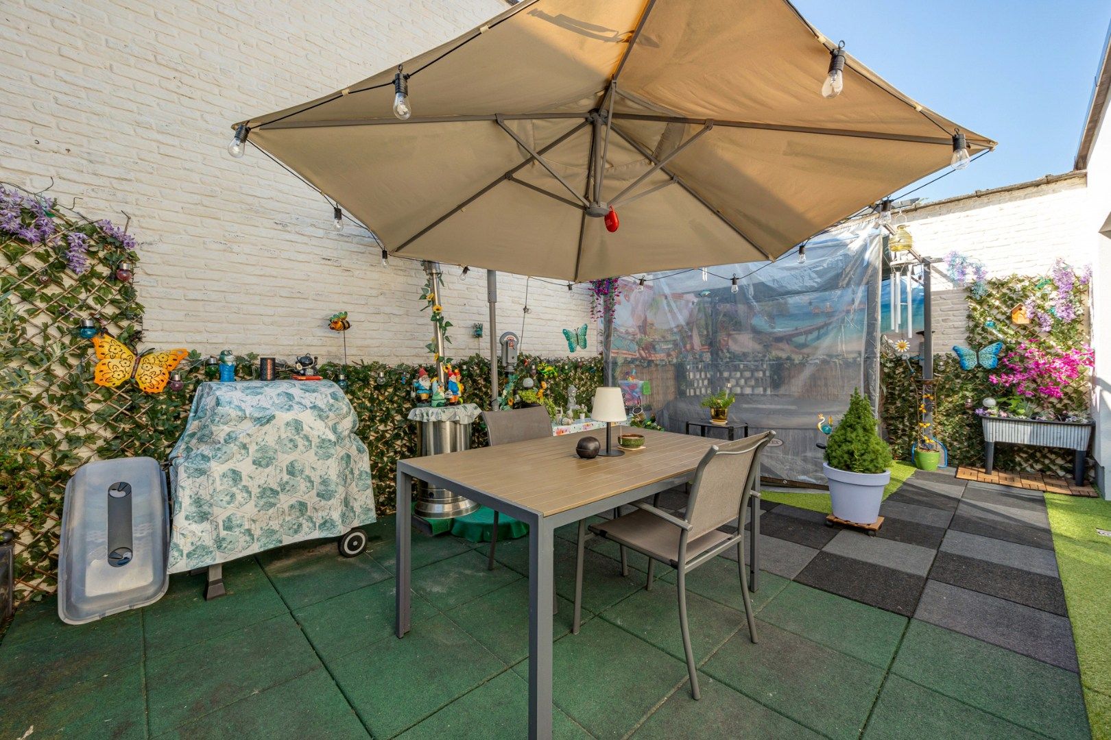 Gerenoveerd gelijkvloers appartement (149m²) met 2slpk, stadstuin en garagebox! foto 3