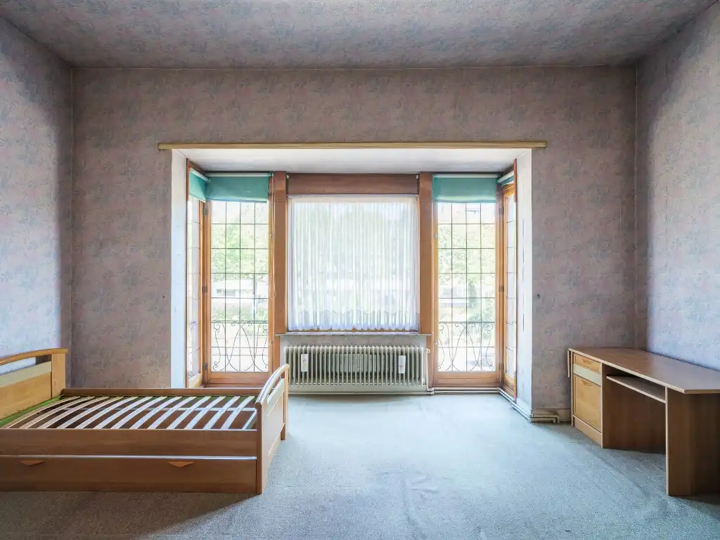 Te renoveren herenwoning met vier slaapkamers en stadstuin nabij het Keizerpark. foto 9