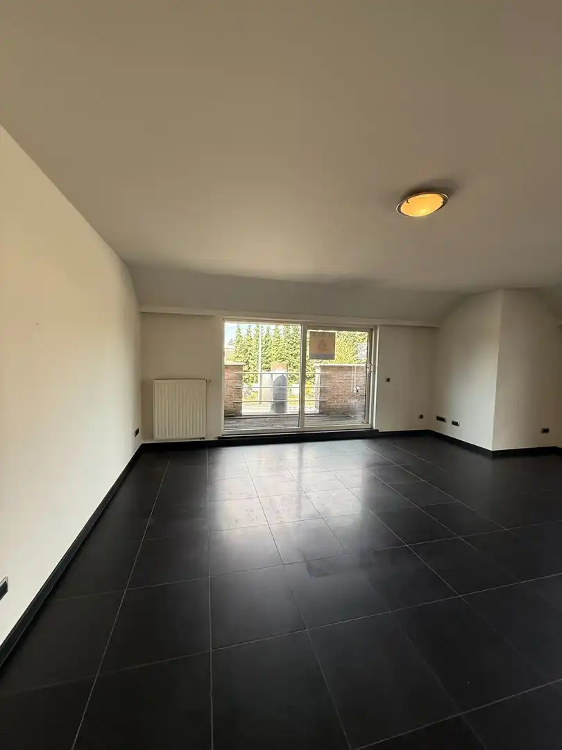 Ruim appartement met 2 slaapkamers en 2 terrassen op een vlot bereikbare locatie in Achel. foto 7