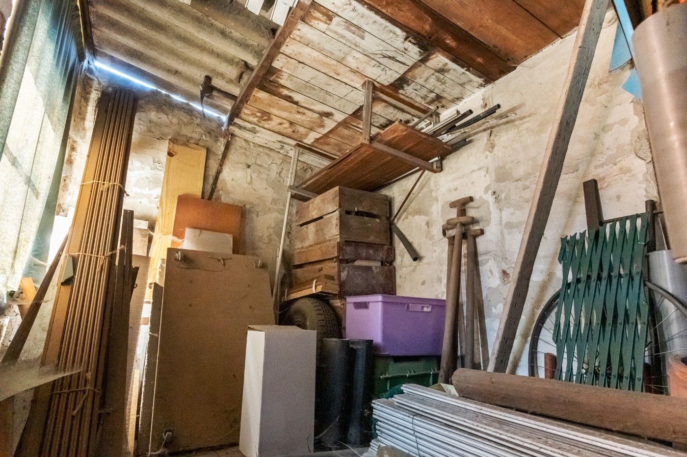 Tof gelegen, te renoveren woning met 2 slpk., garage en tuin foto 10