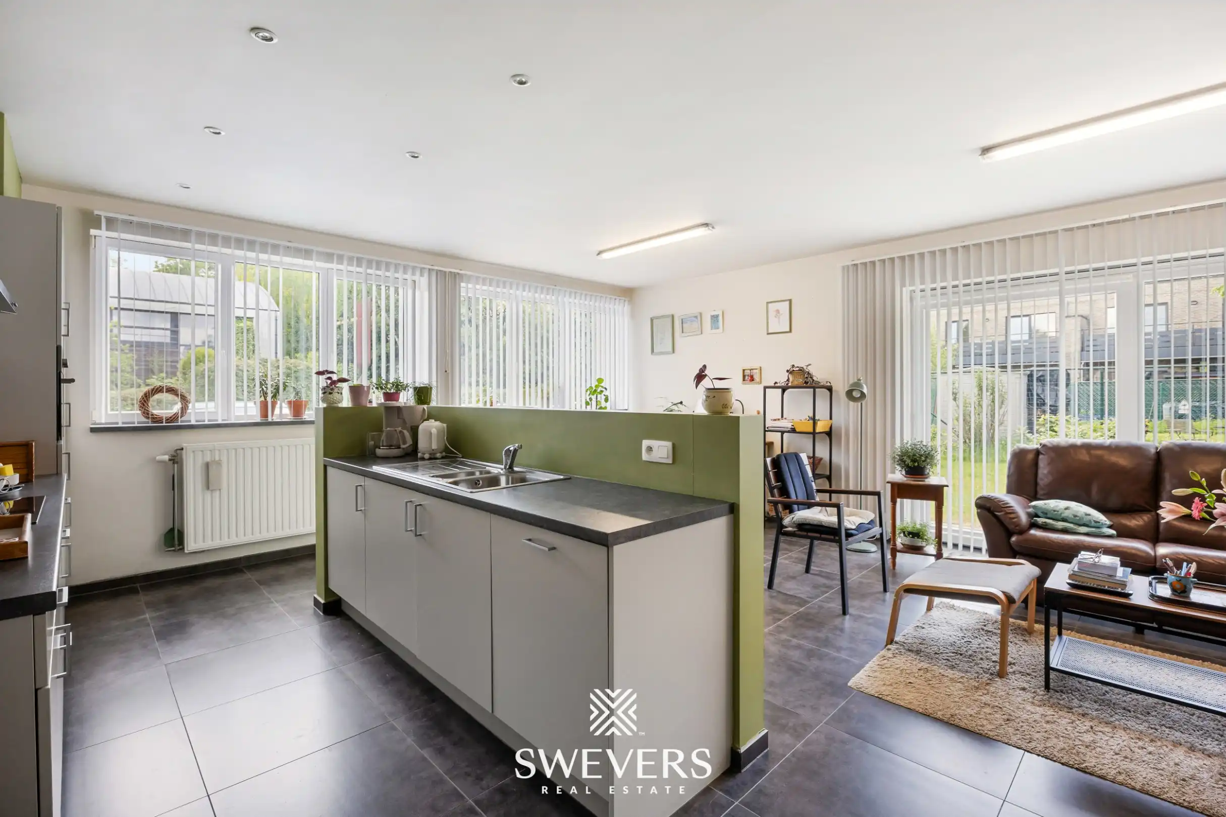 Gelijkvloers appartement met twee slaapkamers en bouwgrond te Herk-de-Stad  foto 4