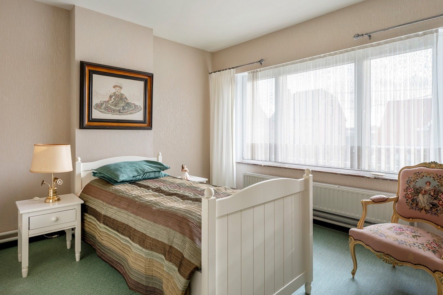 Goed onderhouden woning met tuin. foto 18