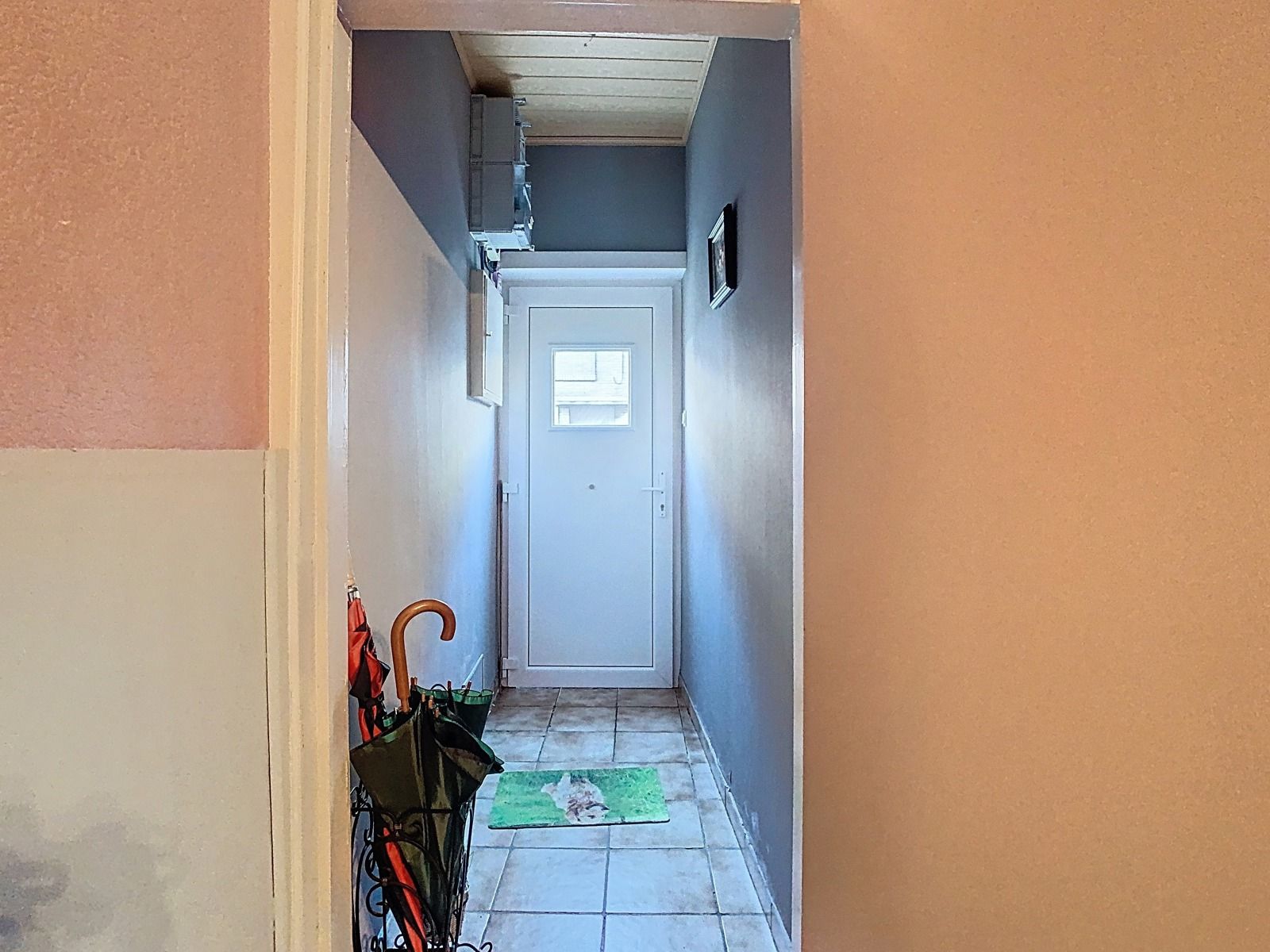 Centraal gelegen, Te renoveren Woning met 2 SLPK én Tuin! foto 12