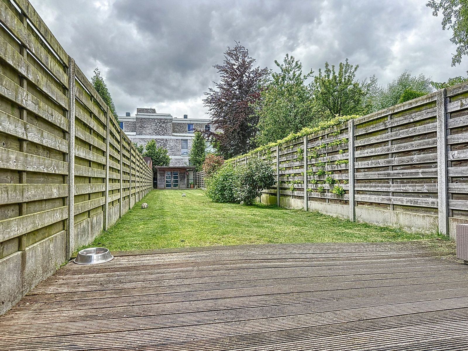 Gelijkvloers handelsruimte met terras en/of tuin foto 2