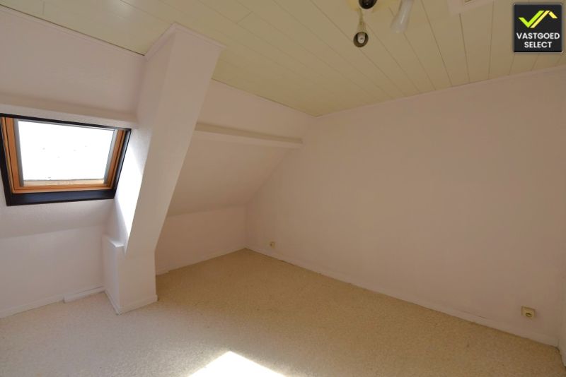 Vastgoed Select: Rijwoning met westgerichte tuin, open zicht, garage en 2 slaapkamers in Eeklo foto 8