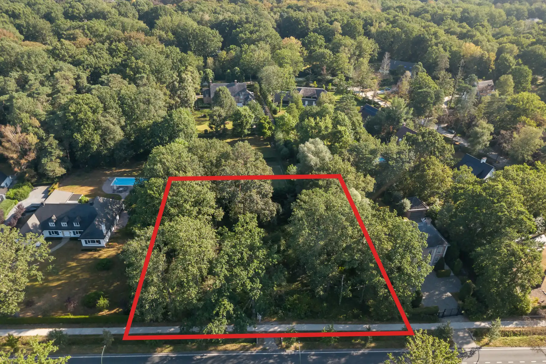 Bouwgrond van 2.247 m²  met een breedte van 50 m. te Schilde foto 2
