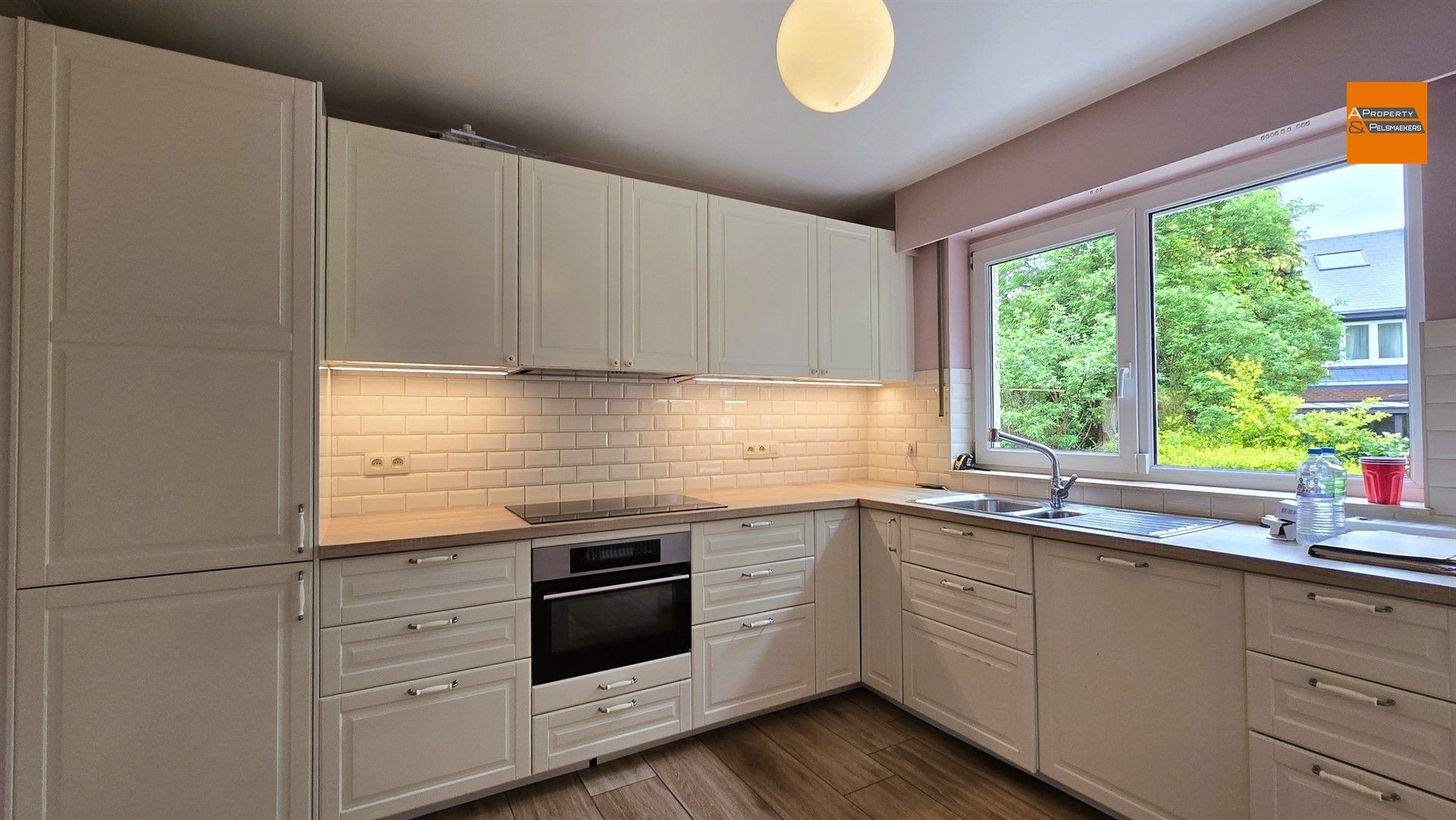Ruime en instapklare bel-étagewoning met 7 slaapkamers en tuin op toplocatie in Kraainem foto 8