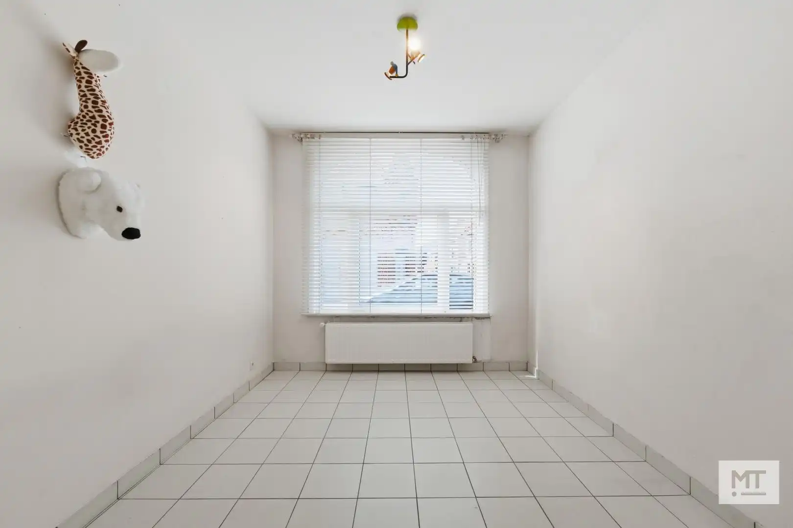 Gelijkvloers twee-slaapkamerappartement met garage te koop in het centrum van Langemark foto 9