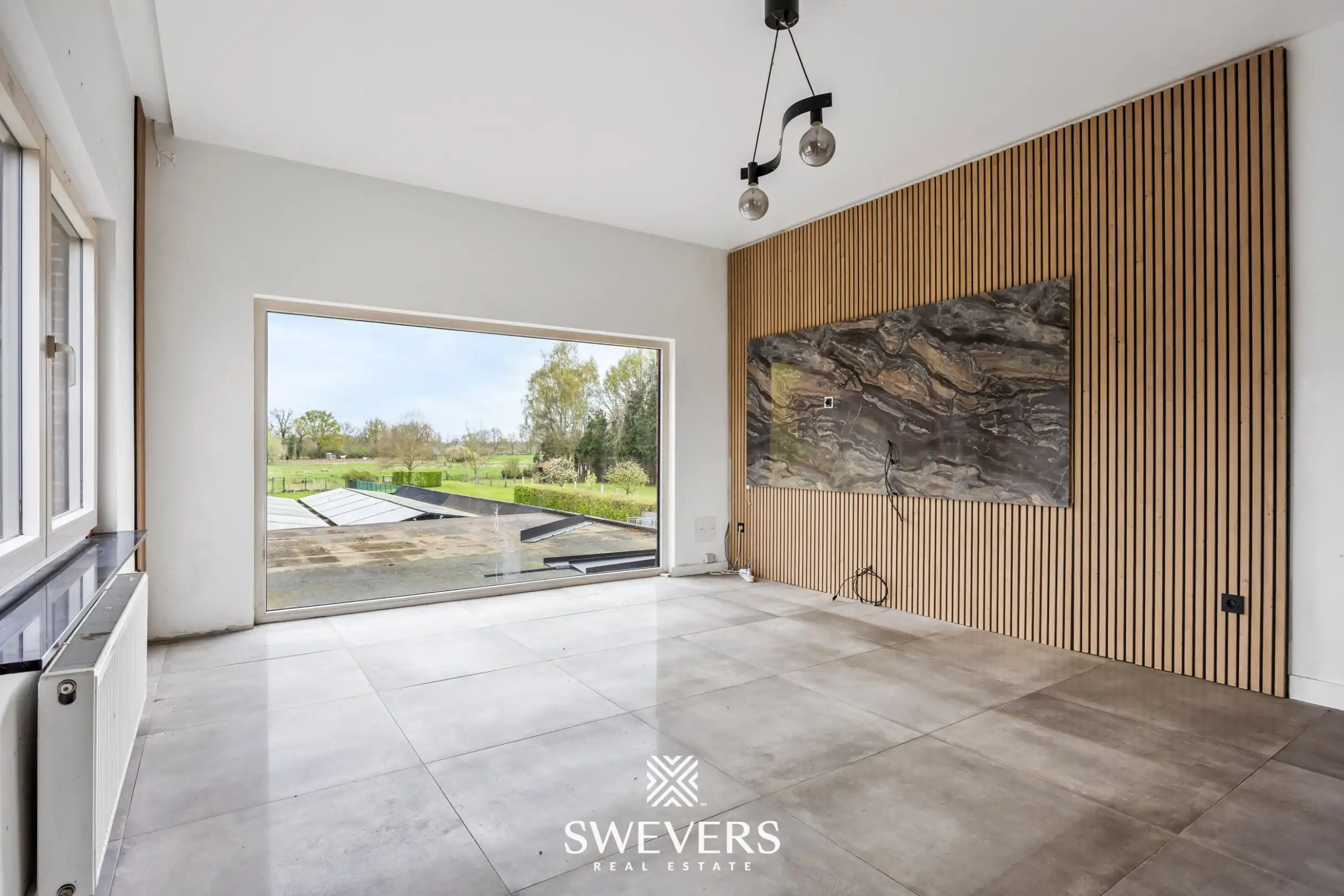 Ruim appartement met gemeenschappelijke tuin te Lummen foto {{pictureIndex}}