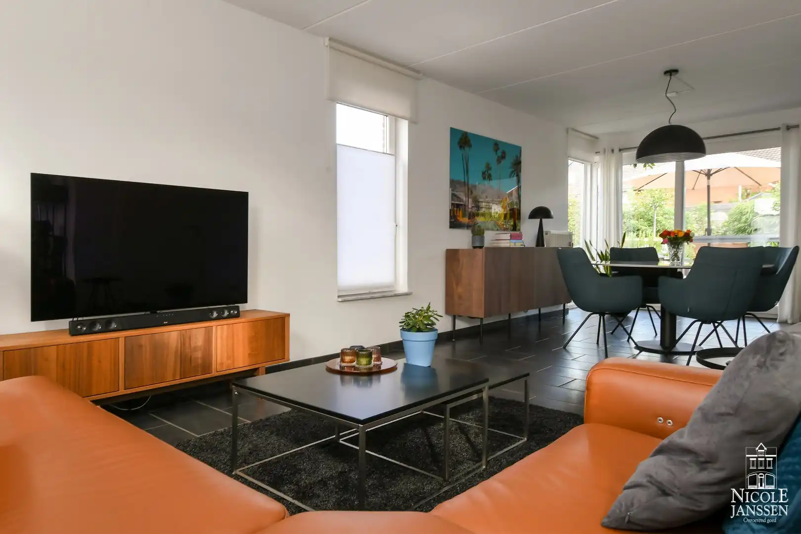 Instapklaar en ruim ingedeeld woonhuis met tuin foto 7