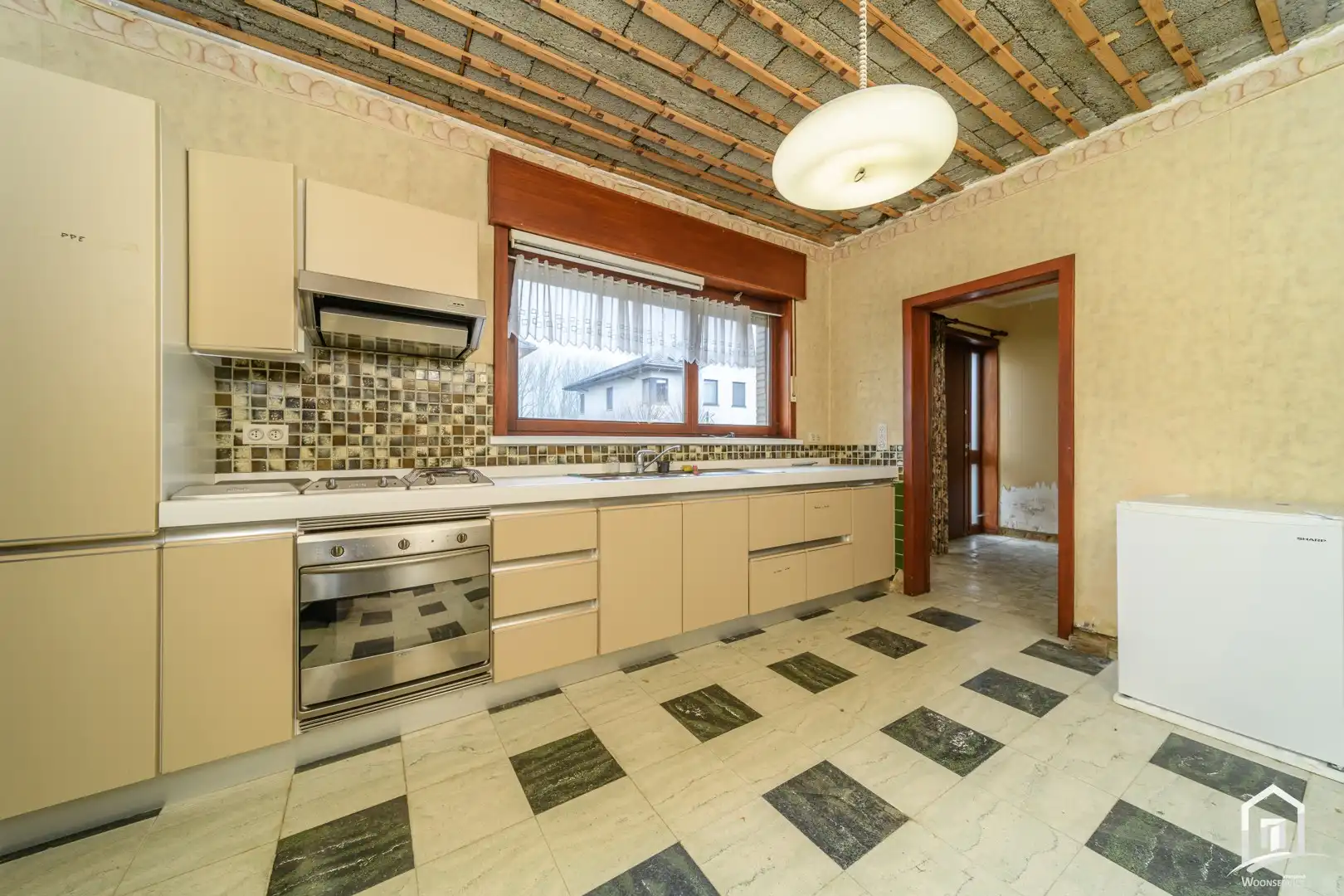 bungalow met achterliggende bouwgrond in het groene Hofstade foto 8