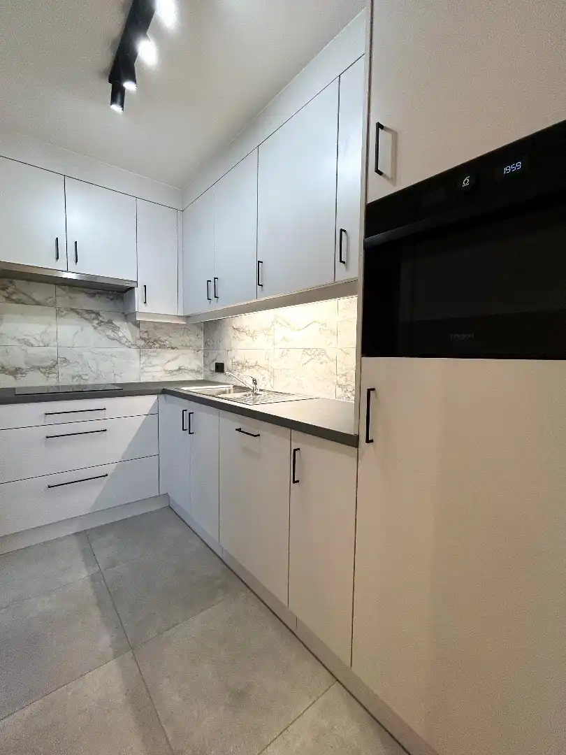 Prachtig gerenoveerd appartement met 2 slaapkamers foto 3