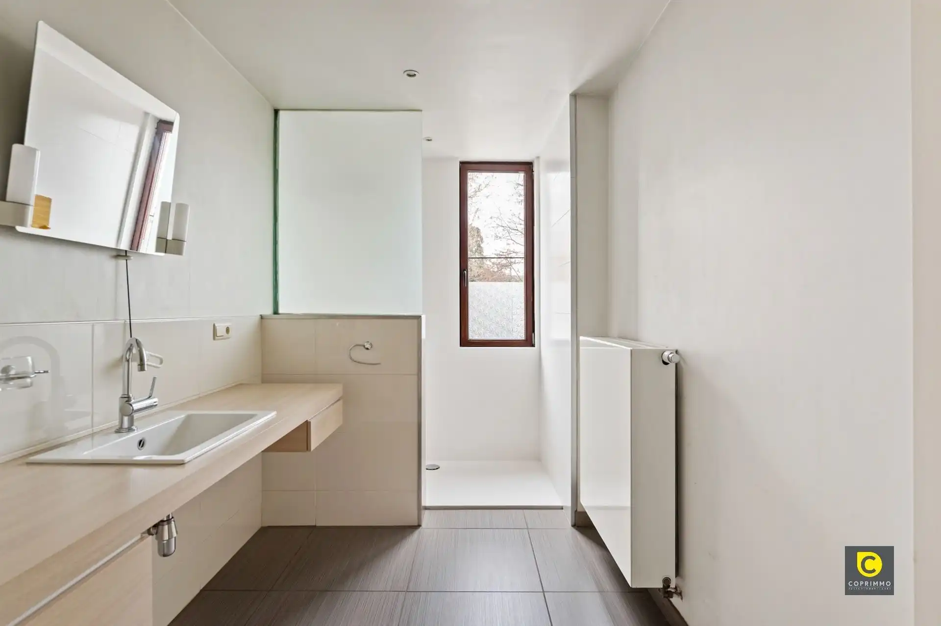 Woning met gezellige tuin en garage op centrale ligging! foto 7