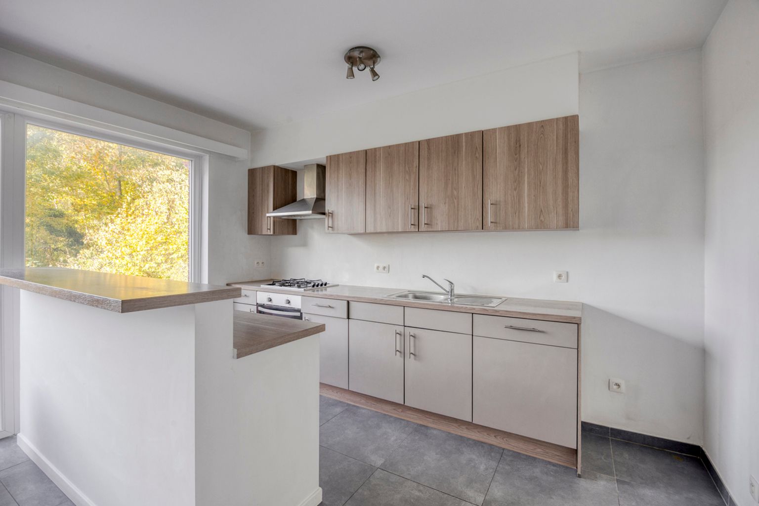 Instapklaar gelijkvloers appartement met eigen tuin foto 7