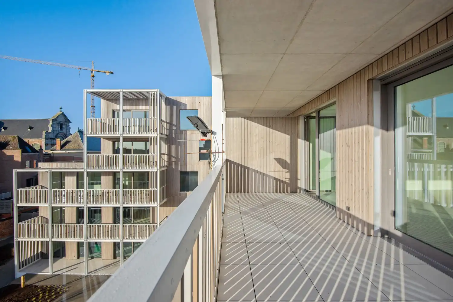 Ruim 1-slaapkamerappartement met groot terras op de derde verdieping – De Lesselier foto 3