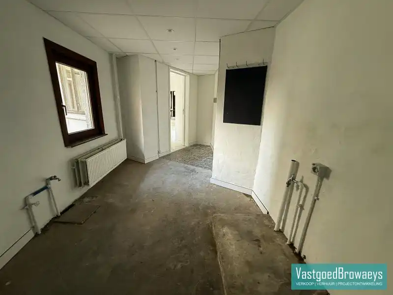 Centraal gelegen basiswoning met tuin en parkeergelegenheid foto 12