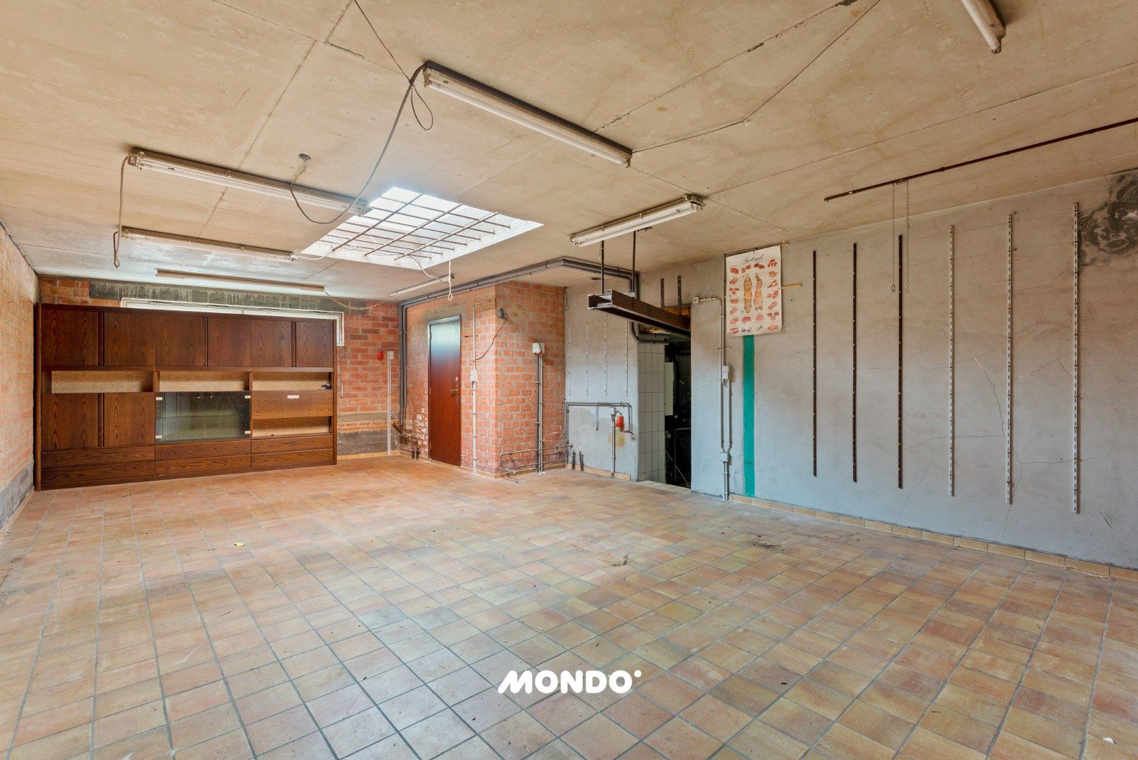 Veelzijdig handelspand met duplex in hartje Willebroek — uitstekende commerciële ligging. foto 18