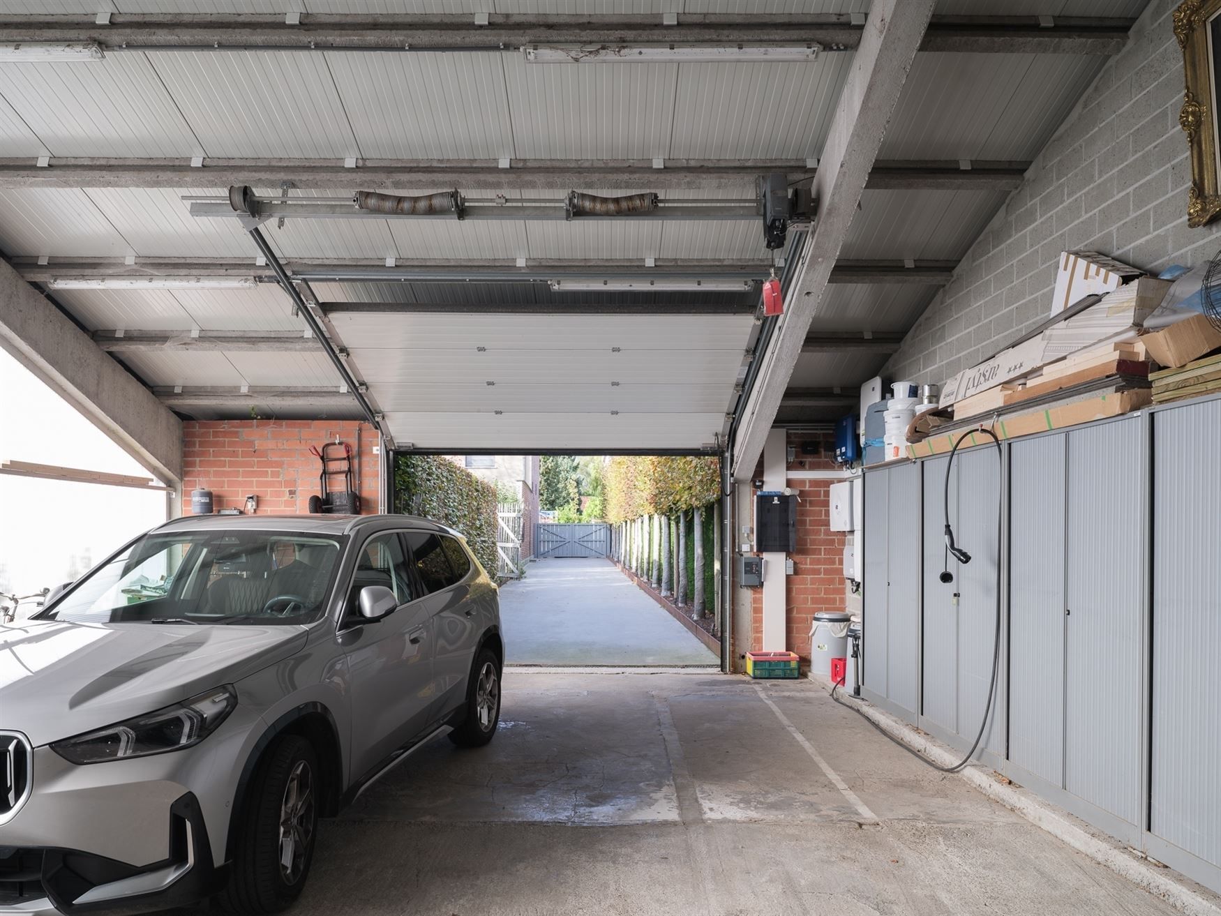 Hoogwaardig afgewerkte herenwoning met zicht op groen en volledige privacy in het hart van Bottelare. foto 22