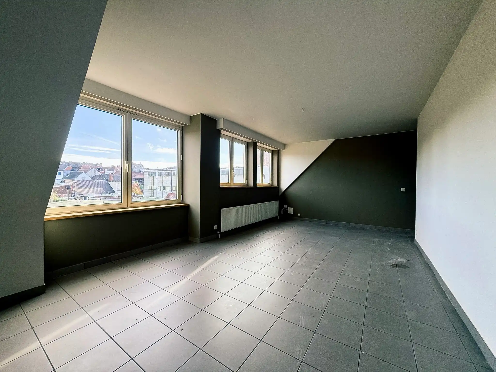 Centraal gelegen 1-slpk appartement te huur in Wetteren foto 9