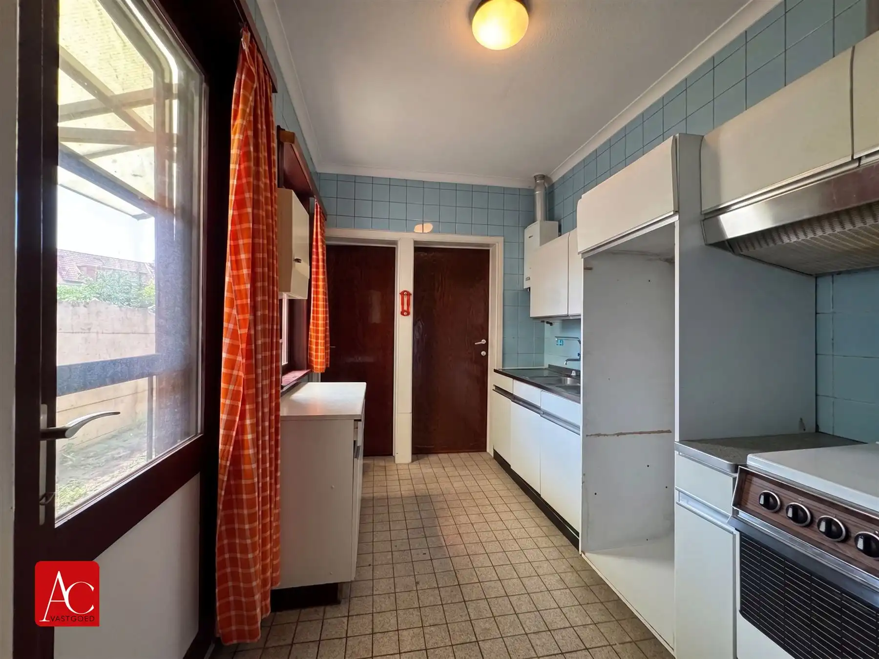 Goed gelegen woning met tuin ter renovatie foto 6