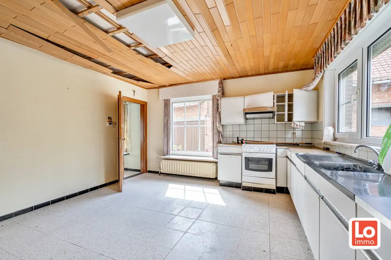 VERKOCHT! Ideaal gelegen groot perceel bouwgrond/projectgrond in het centrum van Kalken! foto 17