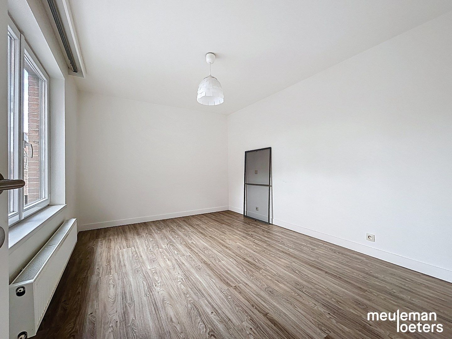 Lichtrijk appartement met drie slaapkamers foto 9