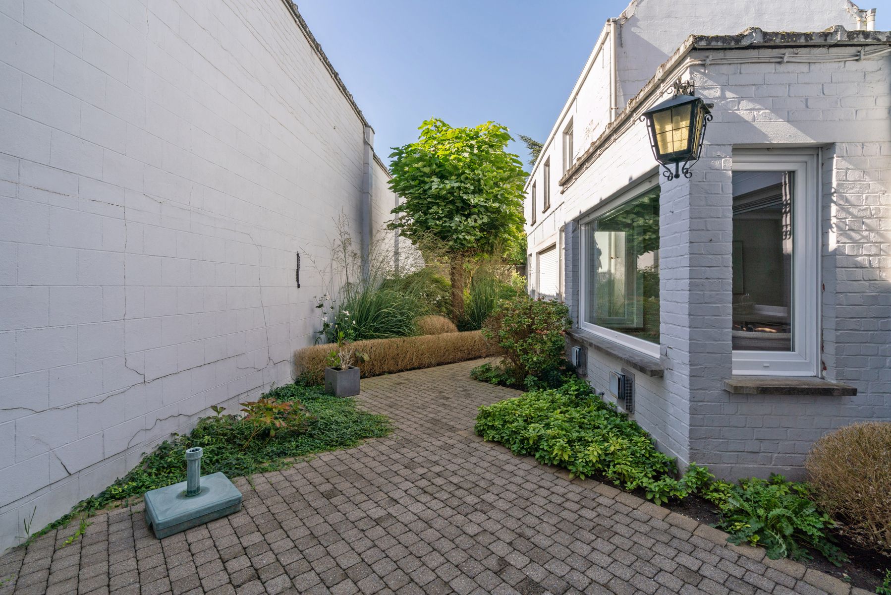 Karaktervolle ruime woning  met bijgebouw/atelier en stadstuin in het centrum foto 22