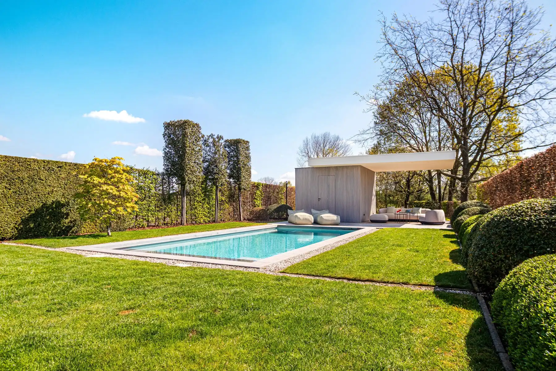 Exclusieve instapklare woning met zwembad en open groenzicht foto 44