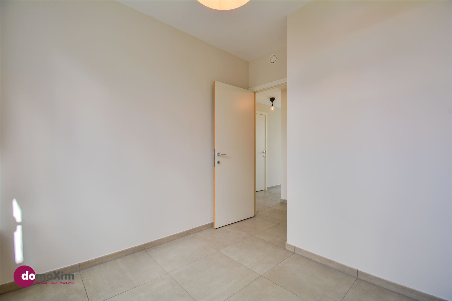Appartement met 2 slaapkamers & terras in het centrum van Boortmeerbeek foto 8
