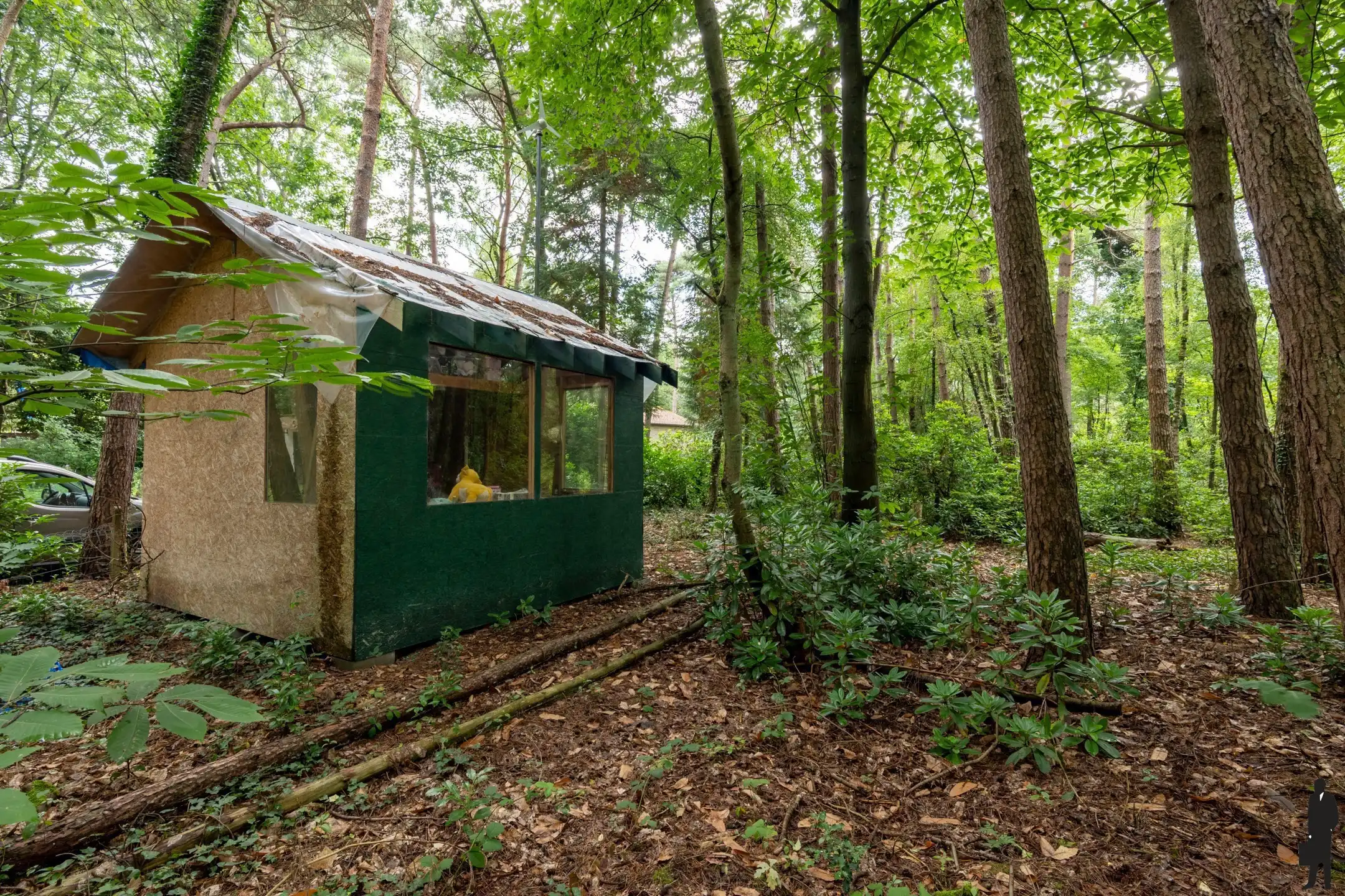 Bouwgrond met af te breken chalet foto 5