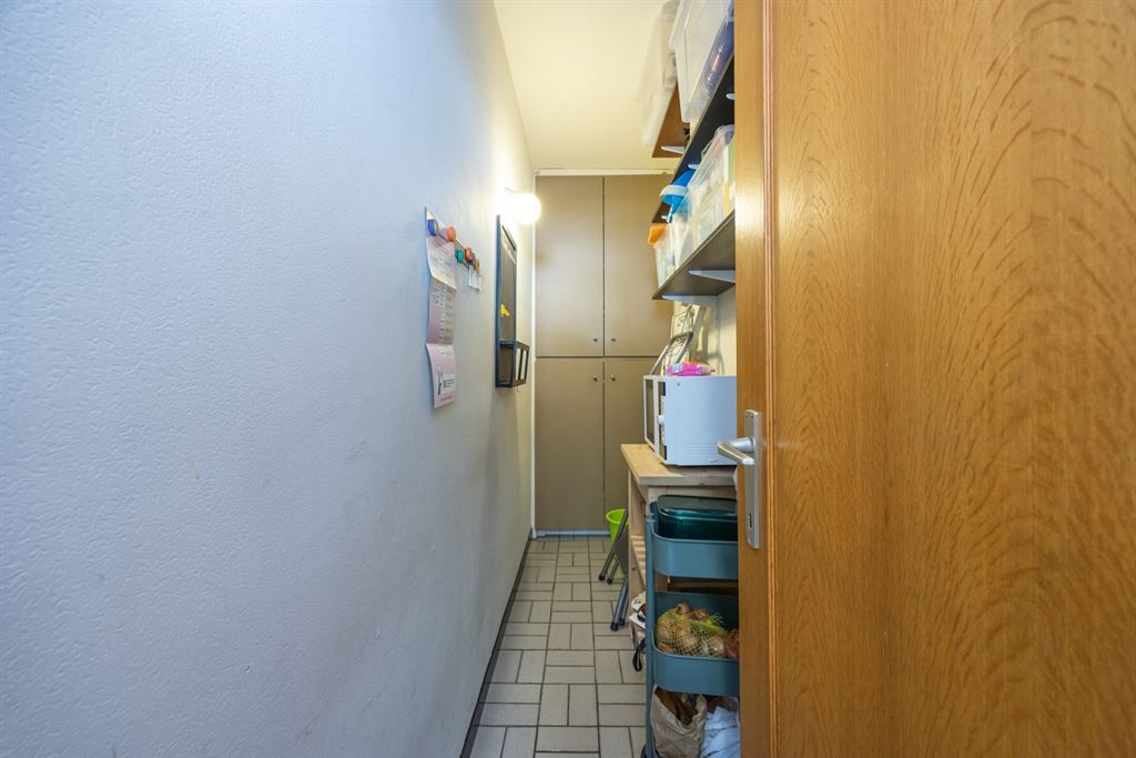 Ruim appartement met uniek dakterras én 2 garageboxen foto 11