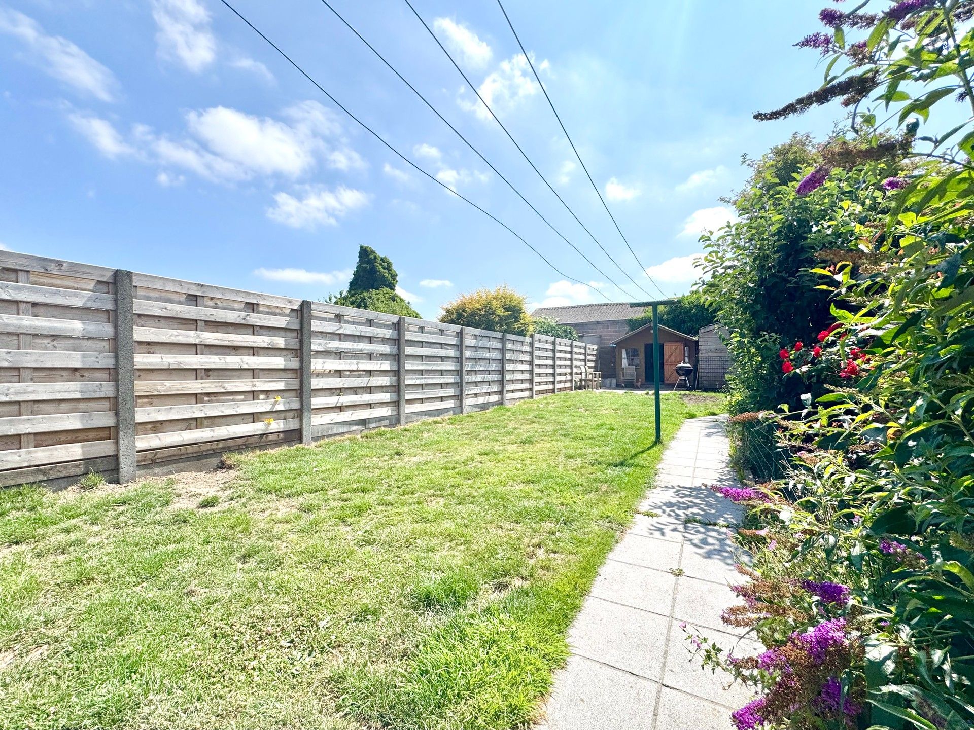 BREDEGEVEL-WONING MET 3 KAMERS, GROTE GARAGE & TUIN foto 7