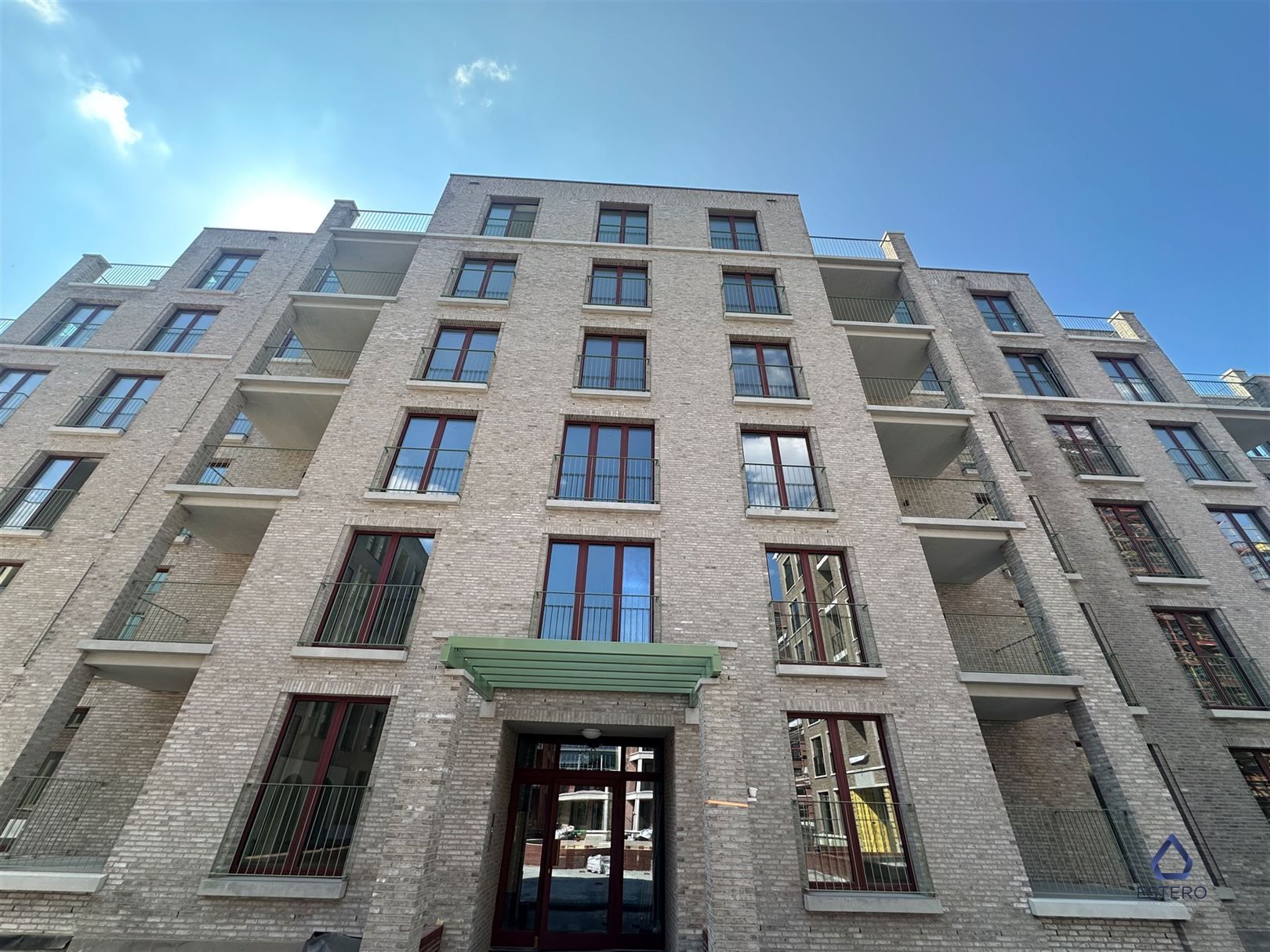 Modern nieuwbouwappt 2-SLK met Terras te Tour & Taxis foto {{pictureIndex}}