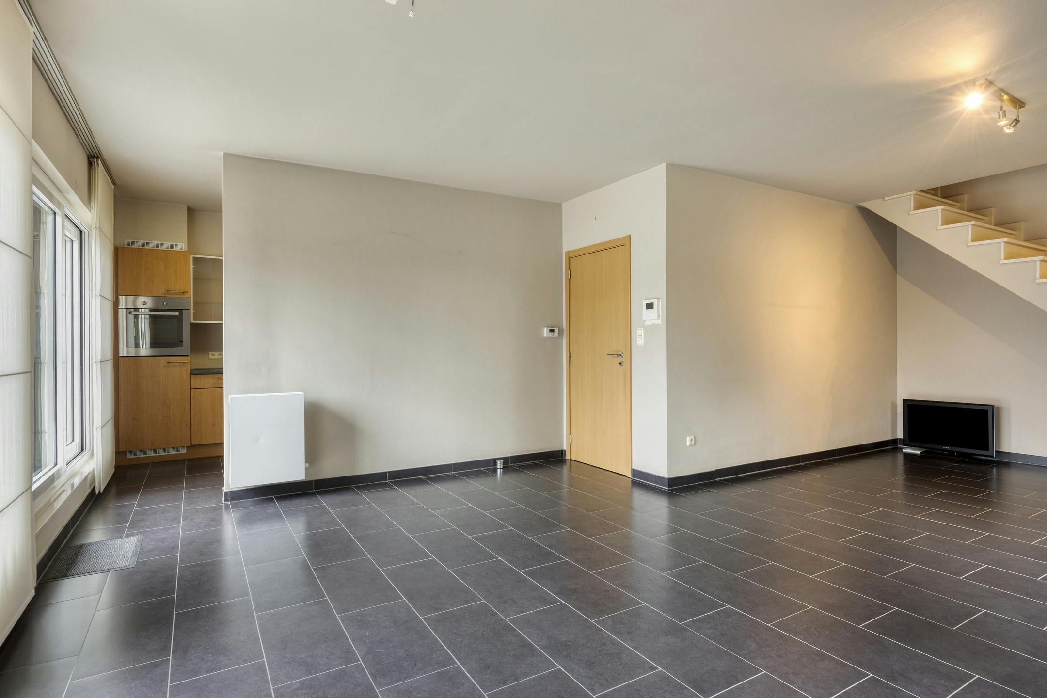 Instapklaar appartement met staanplaats en groot terras nabij centrum Diepenbeek foto 9